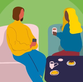 Two people having a coffee and snacks